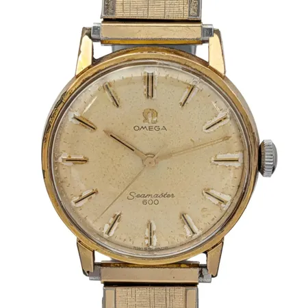 Herrur Omega Seamaster 600, doublé, Ø34 mm, manuell - fungerar, universal länk i stål, lysmassa från timvisare har lossnat och ligger löst innanför glaset, missfärgad urtavla, slitage, 