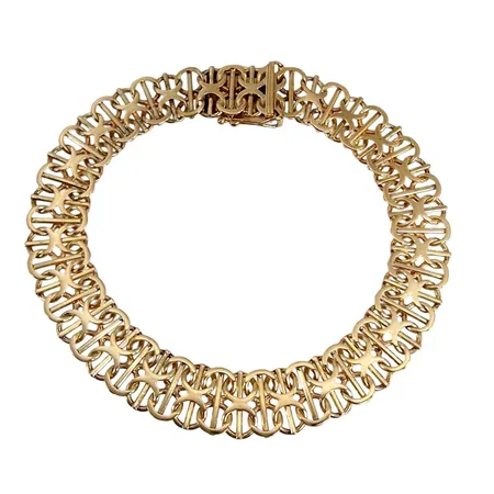 Armband X-länk, 18K guld, N S E Guldvaru Aktiebolag, Köping, svensk kontrollstämpel, längd knäppt 20,5 cm, bredd 10,5 mm Vikt: 18,4 g