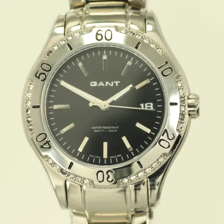 Damur GANT med vita stenar på glasringen, modell 1021,  Ø38mm, omkrets handled 18cm + lös länkbit, batteribyte krävs.  Skickas med paket.