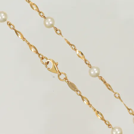 Halsband med pärlor, längd ca, 44cm, bredd 3-4mm, 18K (bruttovikt 6,9g) guldvikt ca 2,7g 