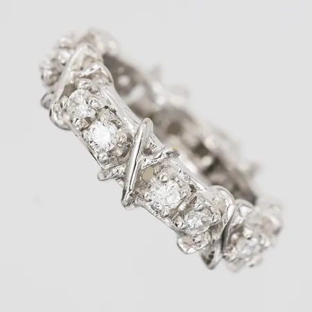 Ring med diamanter 14x0,05ct, stl 16¾, bredd 4mm, vitguld, 18K Vikt: 6,9 g