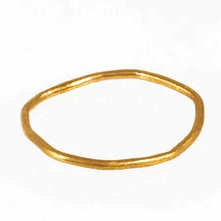 Defekt guld i 23K. Vikt: 1,0g. 