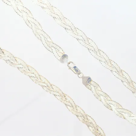 Set. Collier flätad längd 43,5cm, bredd 7,20mm, armband flätad längd 19,5cm, bredd 7,20mm, silver 925/1000 Vikt: 26,6 g