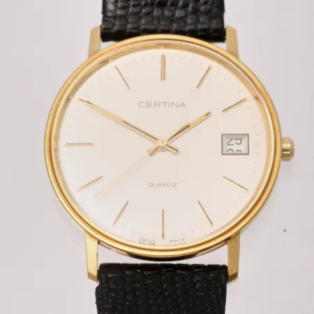 Herrur Certina i 18K guld, Ø33mm, quart, datum, gravyr, "för nit och redighet..." i behov av batteribyte, läderband. Vikt: 0 g