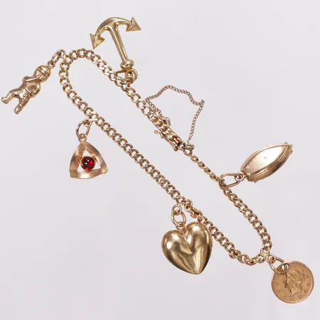 Armband, Pansar, sex berlocker, röd sten, längd ca17cm, bredd 3-mm, säkerhetskedja, buckliga vissa berlocker, 18K Vikt: 12,4 g