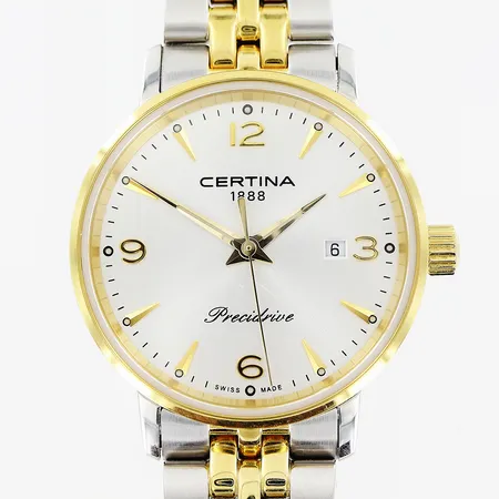 Damur Certina DS Caimano Lady, stål/gulmetall, quartz, datum, ref nr VT79AV5L0, serienummer C035.210.22.03702, länk 16,5cm, extra länkbitar 2cm, garantikort Augusti 2019 Mobilia Urhandel, i behov av batteribyte, 2 mindre repor mitt på glas, övrigt i nyskick, bok, box, ytterkartong.