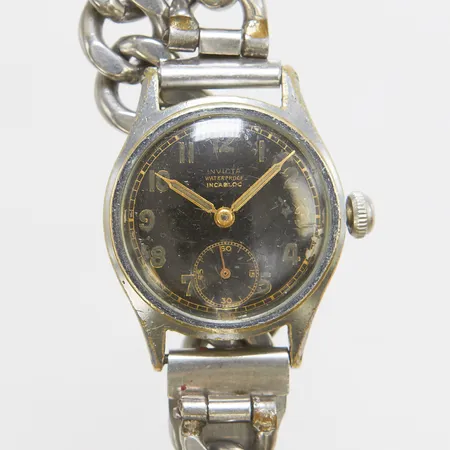 Armbandsur Invicta, stål, manuell, 28,5mm, stållänk, skadad urtavla, tydlig slitage, skadad krona, inga andra tillbehör. 