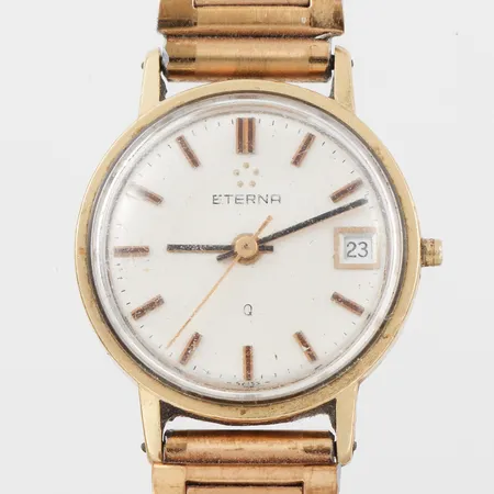 Damur Eterna, gravyr,fungerar ej, diameter 21.7 mm, metallband,18k.