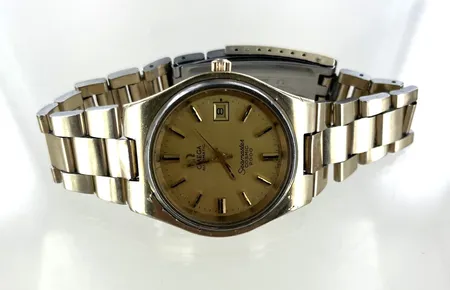 Herrur Seamaster cosmic 2000 Automatic, diam 37 mm, gulmetall, slitet armband,  med låda Skickas med postpaket.