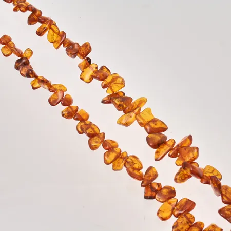 Bärnstens collier, 72cm, docerat, bredd 11-21,2mm. 