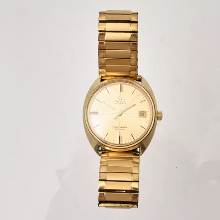 Herrur Omega Seamaster Cosmic, Ø36mm, autoat, datum, doublé, flexband i metall, går en stund men stannar, boett-nr 166026-Tool 107, box.