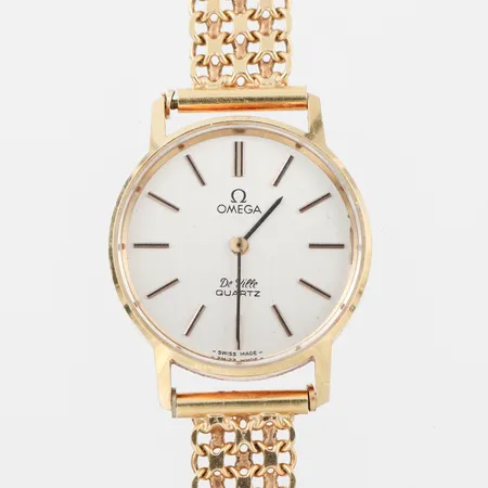 Damur Omega De Ville, fungerar ej, kronan saknas,gravyr,18k i ur och band,totalvikt 32.5 gram. Vikt: 32,5 g