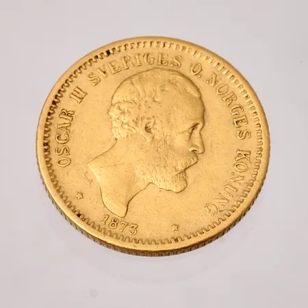 Guldmynt 10kr, Ø18mm, Oscar II Sveriges och Norges konung, 1873, 21,6K, vikt 4,47g.
