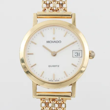 Damur Movado med gravyr, batteribyte behövs,diameter ca 24.4 mm, 18k i ur och band,totalvikt 26.1 Vikt: 0 g