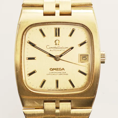 Herrur Omega Constellation 18K, automatisk, 39x33mm, datum, integrerad guldlänk 18K, refnr 368.852, viklås, ca 19cm, repor på plexiglas, boett och länk, bruttovikt 140,7g