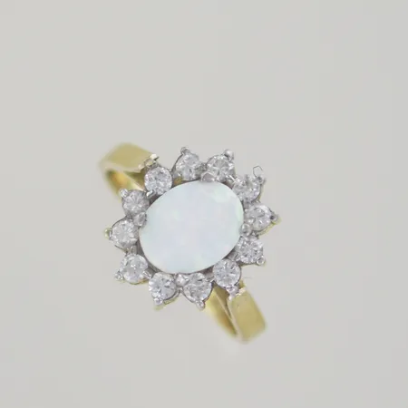 Ring med stenar/månsten, Ø 17½ mm, bredd 14x11 mm, 14K Vikt: 4,2 g