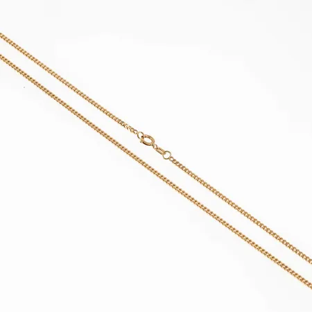 Kedja pansar i 14K guld. Den är 40 cm lång, 1,8 mm bred och väger 3,8g. Springring. Stämplad MIDAS 14K.