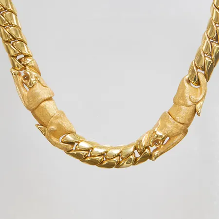 Collier, kattdjurs-detaljer, längd ca 44,6cm, bredd 12,5mm, ihålig, bucklig, 18K Vikt: 92,4 g