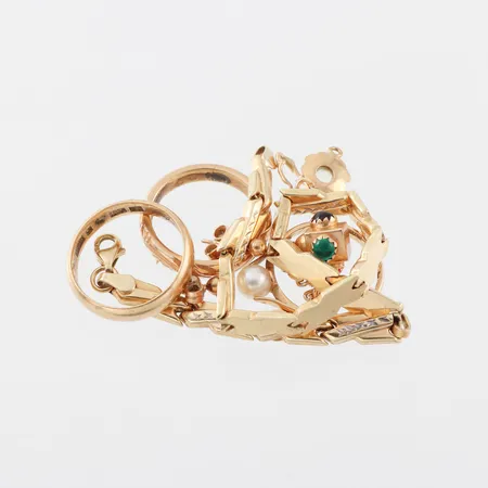 Trasigt guld, någon sten,18k. Vikt: 21,9 g