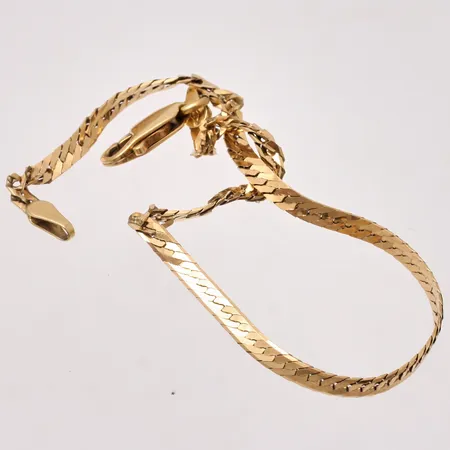 Defekt guld, 18K, vikt 3,4g.