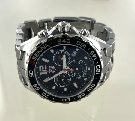 Herrur Tag Heuer  senna CAZ1015.BA0883, låda och extra länkar Skickas med postpaket.