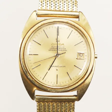 Herrur Omega Constellation 18K, automatisk, 35,5mm, datum, skadat armband 18K, längd 19,5cm, repigt plexiglas, krona saknas, bruttovikt 86g