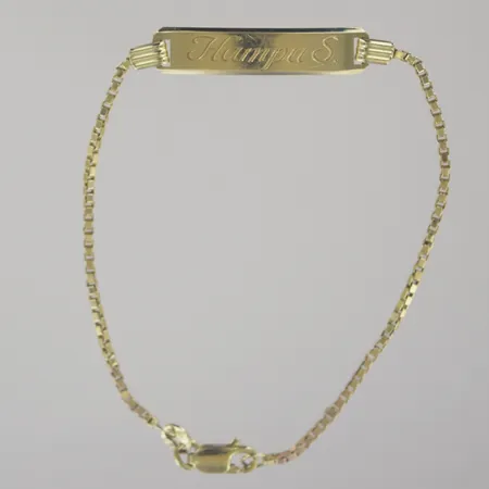 Armband, längd md bricka, längd 18 cm, graverad, 18K Vikt: 4,7 g