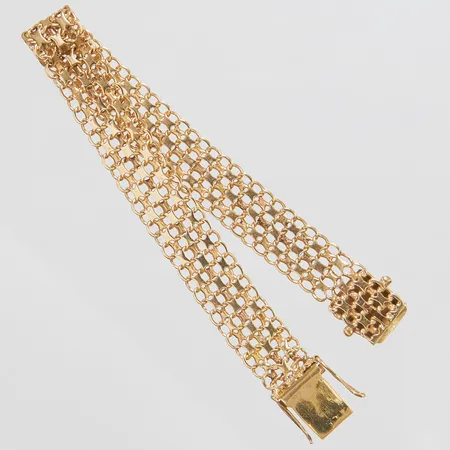 Armband X-länk, längd ca 19cm, bredd 12mm, bruksslitage, 18K Vikt: 16,6 g