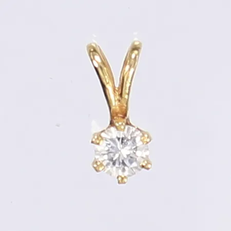 Hänge med dia tot ca 0,17ct, längd 10mm, bredd 5mm, 18K Vikt: 0,4 g
