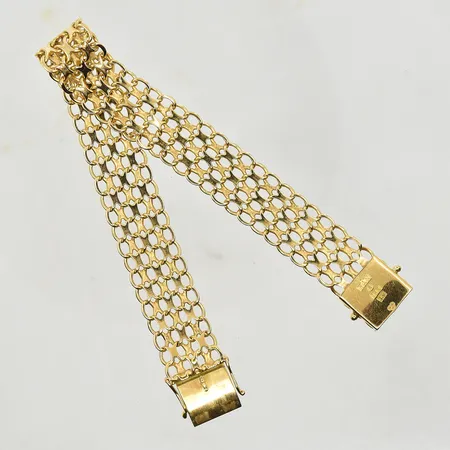 Armband X-länk, längd 19½ cm, bredd 13 mm, 18K. Vikt: 20,4 g