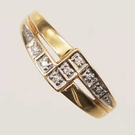Ring diamanter 7x ca 0,005ct, stl 16½, bredd 6,7mm, 18K Vikt: 2,3 g