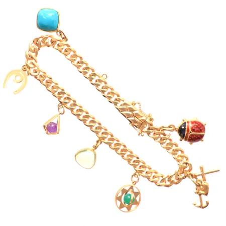 Armband, Bismarck, 7 st berlocker, längd ca 20cm, bredd: 6mm, säkerhetskedja, 18K. Vikt: 21,5 g