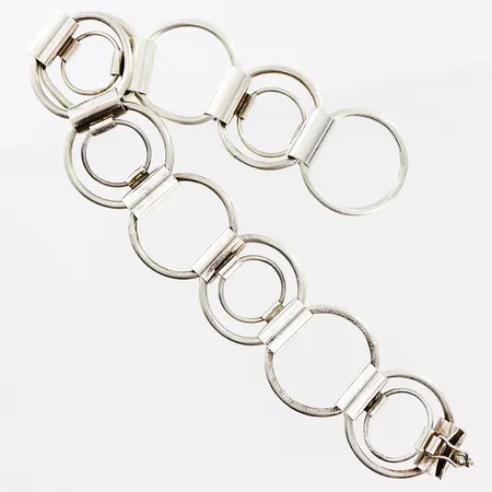 Armband 20cm, bredd 23mm, länkdelar med skevheter, lås i behov av justering, SAM, silver 925/1000. Vikt: 31,5 g