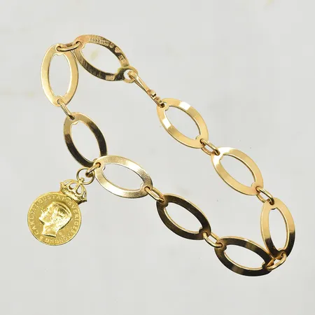 Armband, längd 20 cm, länkens bredd 10 mm, fast berlock Ø15 mm med text För långvarig uppskattad arbetsinsats, kroklås, 18K. Vikt: 19,3 g