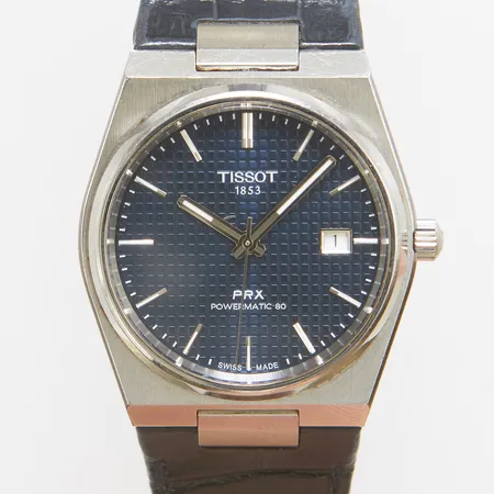 Herrur Tissot PRX Powermatic 80, stål, automatisk, 40mm, refnr T137407A, serienr TD124A7UR, safirglas, blå urtavla, datum, läderband samt stållänk, viklås, länkbitar, manual, skadad box, ytterkartong.