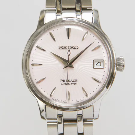 Damur Seiko Presage, stål, automatisk, 34mm, ref 4R35-02T0, snr 411753, rosa urtavla, datum, safirglas, stållänk, extra länkbitar, viklås, box, ytterkartong.