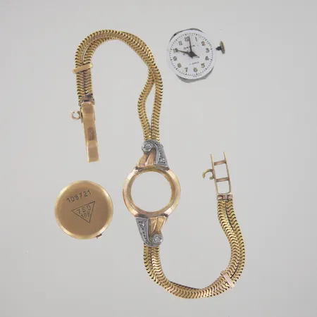 Damur Orvin, längd 19 cm,  diam 17,5 mm, glas saknas, 18K, netto 14,4 gr