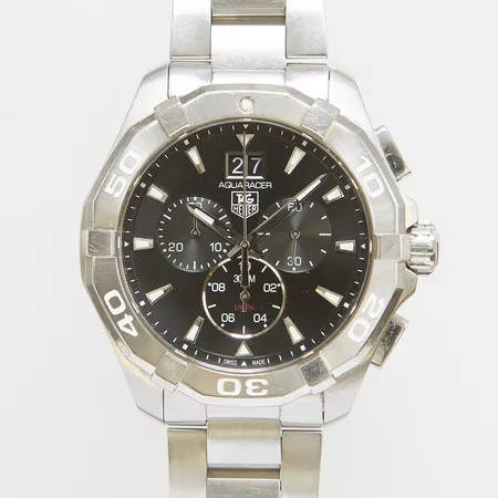 Herrur Tag Heuer Aquaracer Chronograph, stål, automatisk, 43mm, refnr CAY1110.BA0927, snr WWF7227, safirglas, datum, kronograf, stållänk, viklås, extra länkbitar, garantikort 2020, tydliga repor på länk samt boett, skruv saknas invändigt, inga tillbehör.