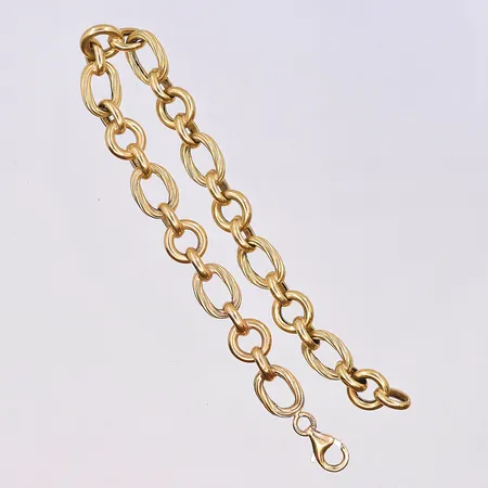 Armband, längd 19,5 cm, bredd 8 mm, 18K. Vikt: 8,6 g