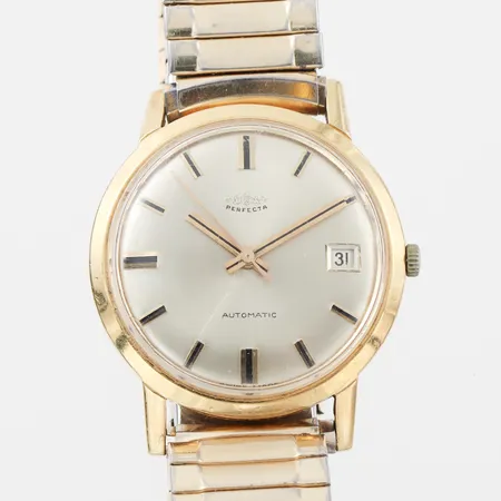 Herrur Perfecta Automatic, diameter ca 33.9 mm, gravyr,tickar igång men ej funktionstestad,18k.