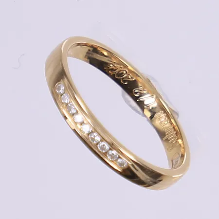 Ring med diamanter totalt 0,09ct enligt gravyr, stl 18¼, bredd 3mm, gravyr, 18K  Vikt: 3,1 g