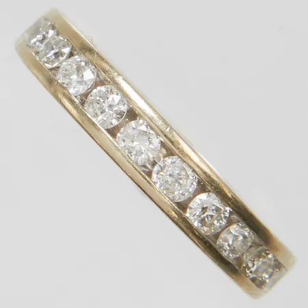 Ring, briljantslipade diamanter 10 x ca 0,04-0,05ct, stl 15¾, bredd 3,2mm, behov av omrodering, ostämplad, vitguld, 14K Vikt: 3,1 g