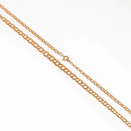 Collier, Bismarck i 18K guld. Det är 47 cm långt, 3,5 - 6,5 mm brett och väger 10,2g. 18K & kattfot. Springring.