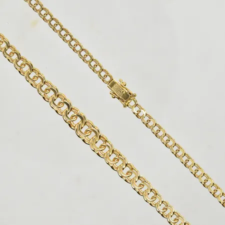 Collier Bismarck, doserad, längd 51½ cm, bredd 3-8 mm, 18K. Vikt: 19,9 g