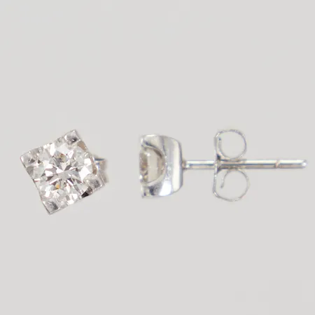 Ett par diamantörhängen, 2x ca 0,50ct ca W-TCr(H-I)/SI, Ø 5,8mm, omaka snurrebussar, stift, vitguld 18K Vikt: 2,5 g