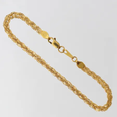Armband, längd 19cm, bredd 3,3mm, ojämn, 21K.  Vikt: 4,3 g