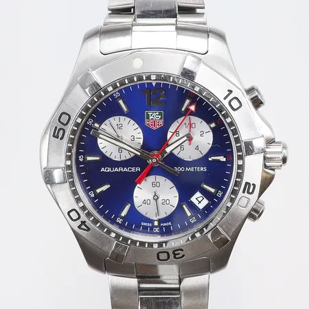  Herrur Tag Heuer Aquaracer Ø41mm, ref nr. CAF112.BA0803, snr. REV5207, quartz (går ej, i behov av batteribyte), kronograf, datum, stållänk, manualer, med box, ytterkartong, certifikat (juli-2010), smärre bruksslitage, små repor, extra länkbit finns 