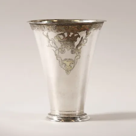 Bägare, Sven Nyberg, Varberg, 1770, spår av förgyllning, stansad bård med bland annat stiliserade blad, kartusch med öppen krona, höjd 19cm, åldersbetingat slitage, senare fot, silver. Vikt: 442 g