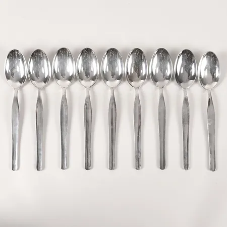 Nio bordsskedar, formgivna av Tapio Wirkkala, Finland, 1960-tal, längd 18cm, slitage, repor, silver. Vikt: 366,9 g