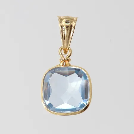 Hänge med blå sten, 22x12mm ink ögla, 18K. Vikt: 1,7 g